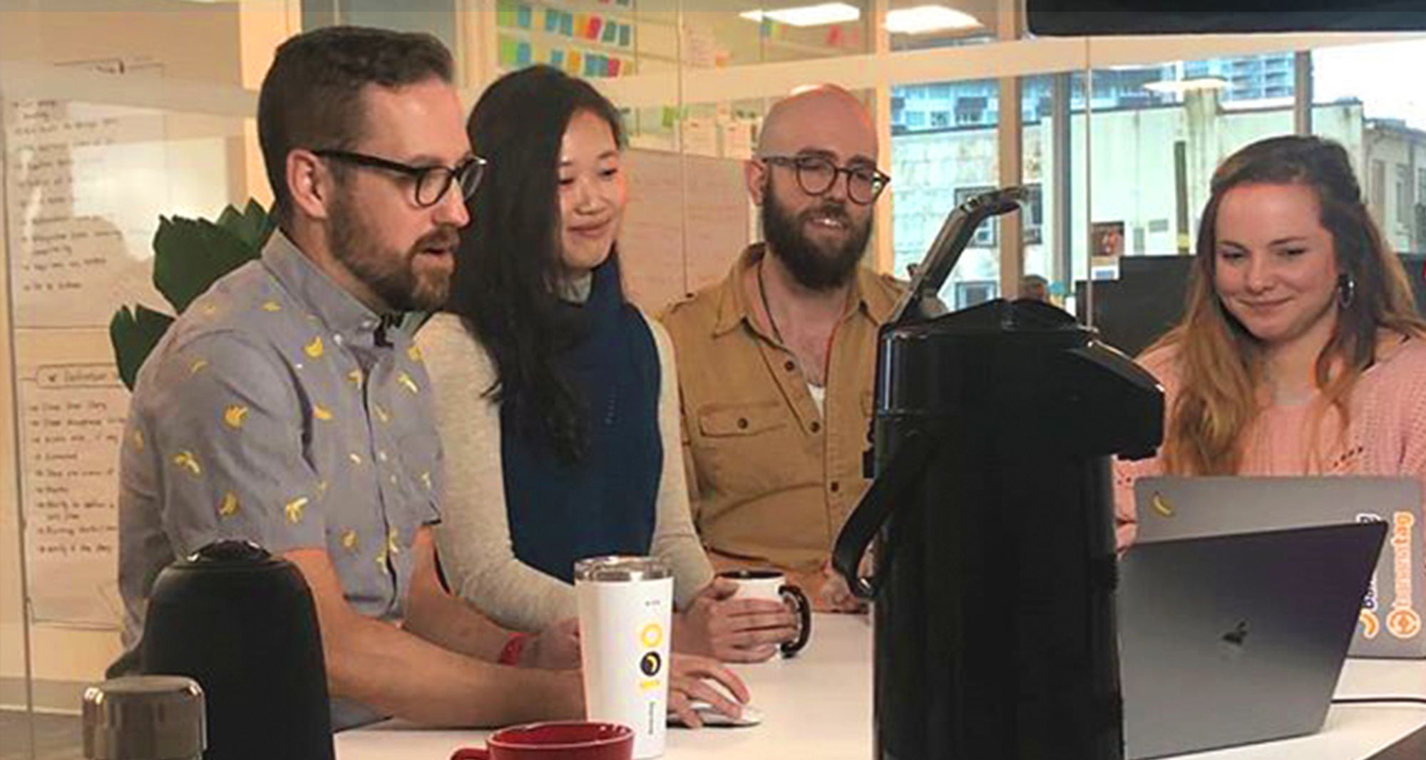 Photo of me an my colleagues in the office recording the webinar