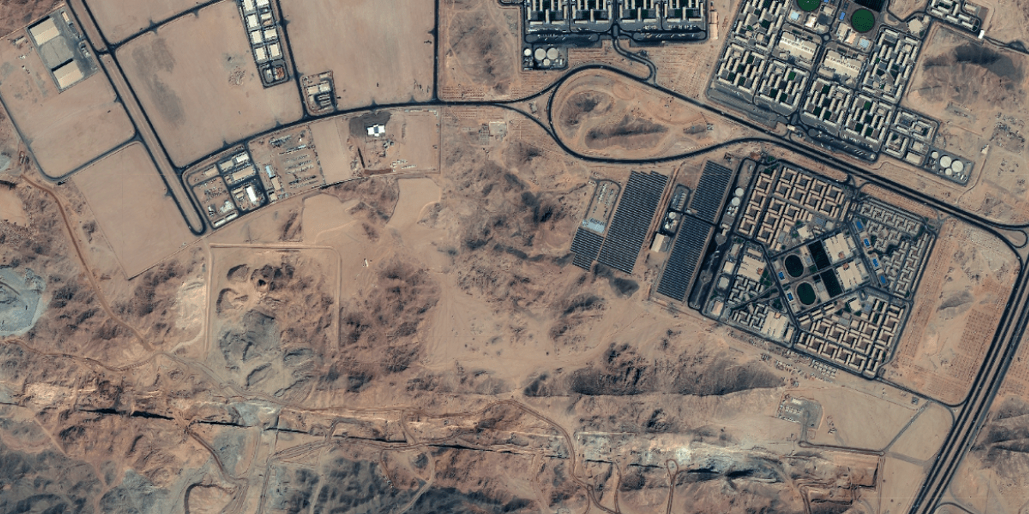 These exclusive satellite images show that Saudi Arabia's sci-fi megacity is well underway